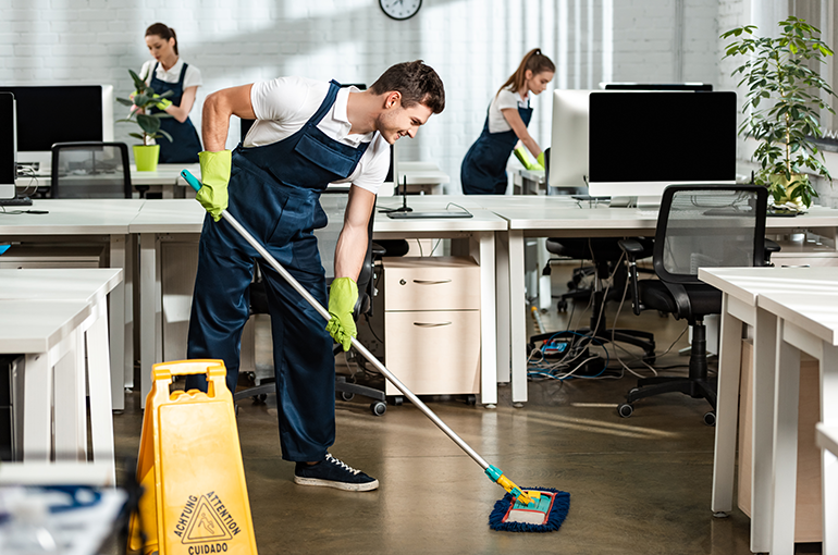 image of a professional cleaning team cleaning an office